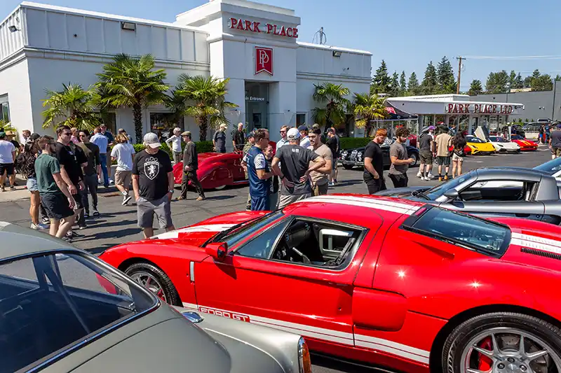 Monopoly Street event with cars and people walking around
